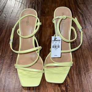 Neon yellow strappy heels